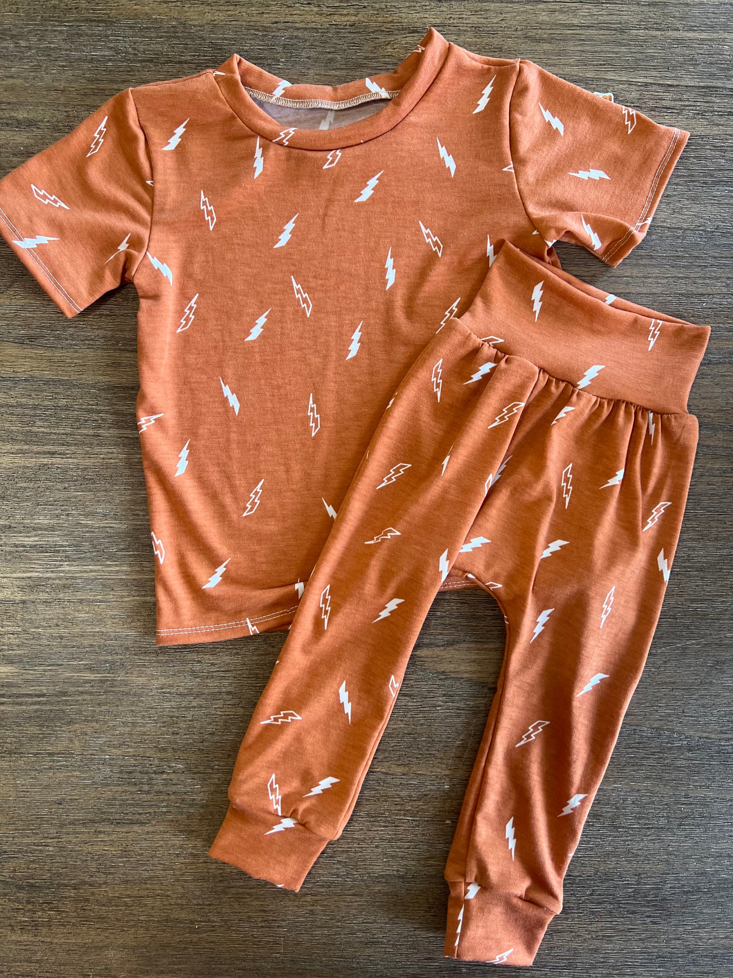 Burnt orange and lighting bolt