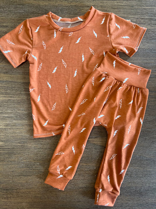 Burnt orange and lighting bolt