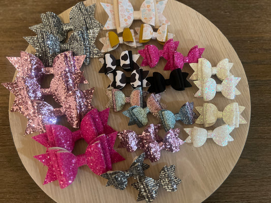 MYSTERY faux leather bows: 4”