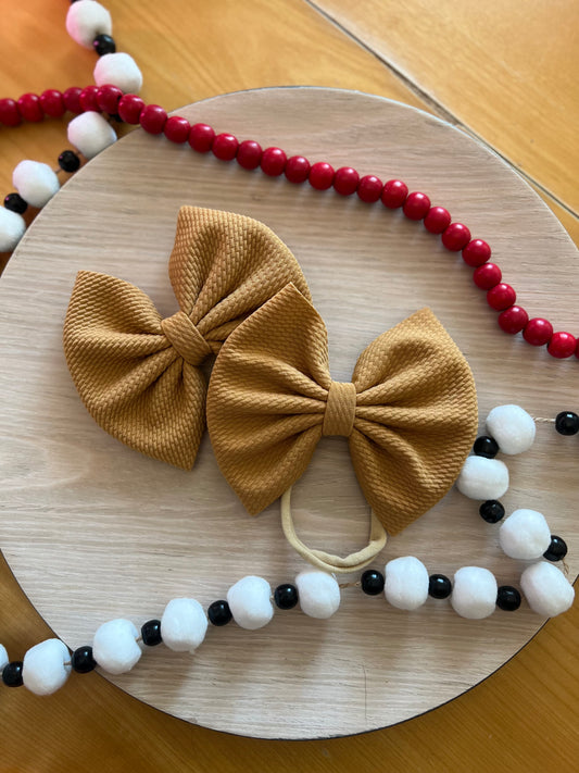 Tan Bow